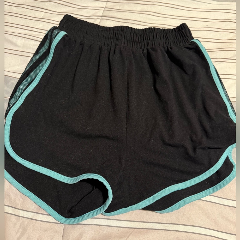 they areblack blue athletic shorts they are size large the brand is called BUZZ